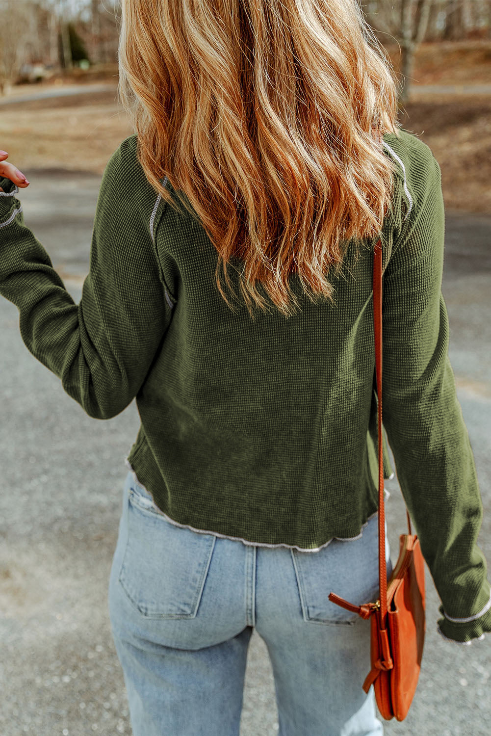 Blusa de manga larga con cuello redondo y textura verde