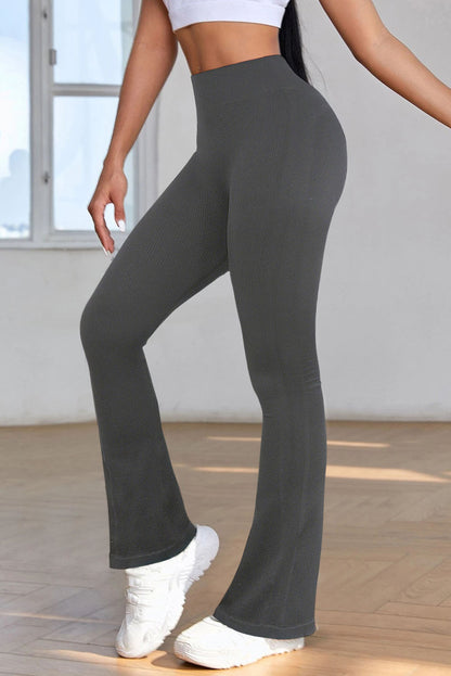 Pantalones deportivos acampanados con cintura alta y control de abdomen de color gris