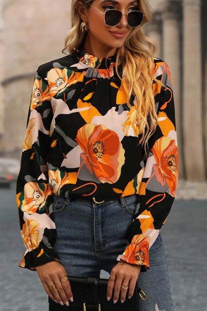 Blusa de cuello alto con estampado floral negro 