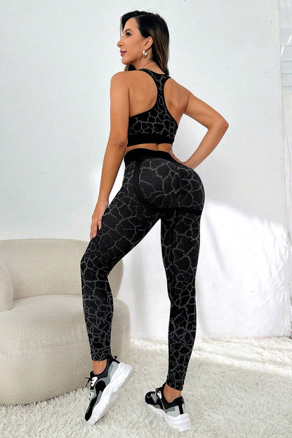 Unleash your wild side with our Animal Print Booty-Boost High Waist Active Set! The racerback top offers the max in mobility and comfort during all activities, while the wide waistband guarantees a snug fit and tummy control. The stylish pattern adds a bold and fashionable flair to your getup, and the booty lift design adds ah-mazing sexiness. Perfect for active lifestyles, this set is perfect for workouts - or just casual loungin'! Comes in Black.