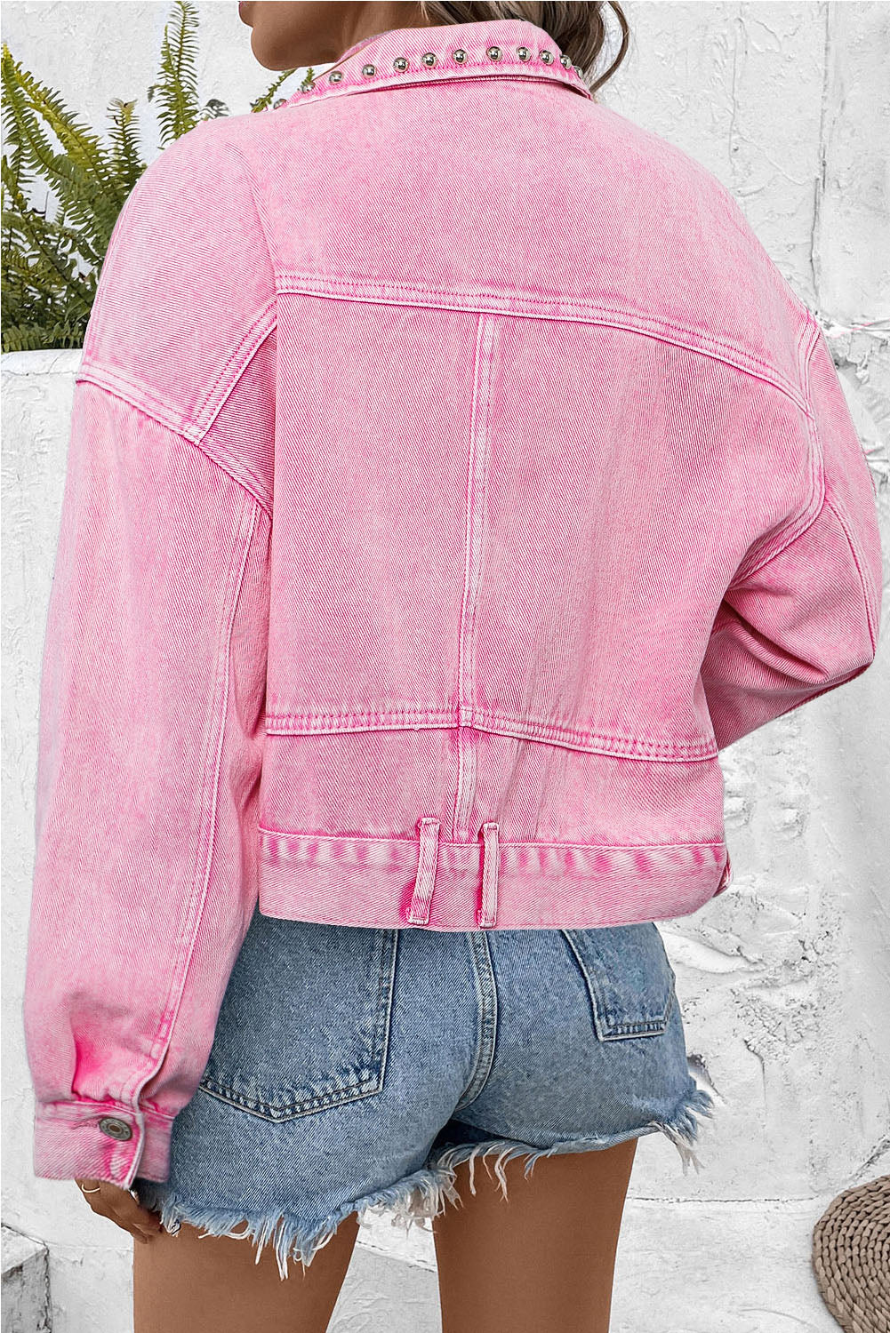 This denim jacket double-dips the style scale with a look that's both stylish and retro. Show off your punk side with its acid wash and rivet-studded details. Made from quality cotton fabric, this jacket's sure to last and will go perfectly over your go-to tops. 100% Cotton. Pink up your Moodz from this Boutique!