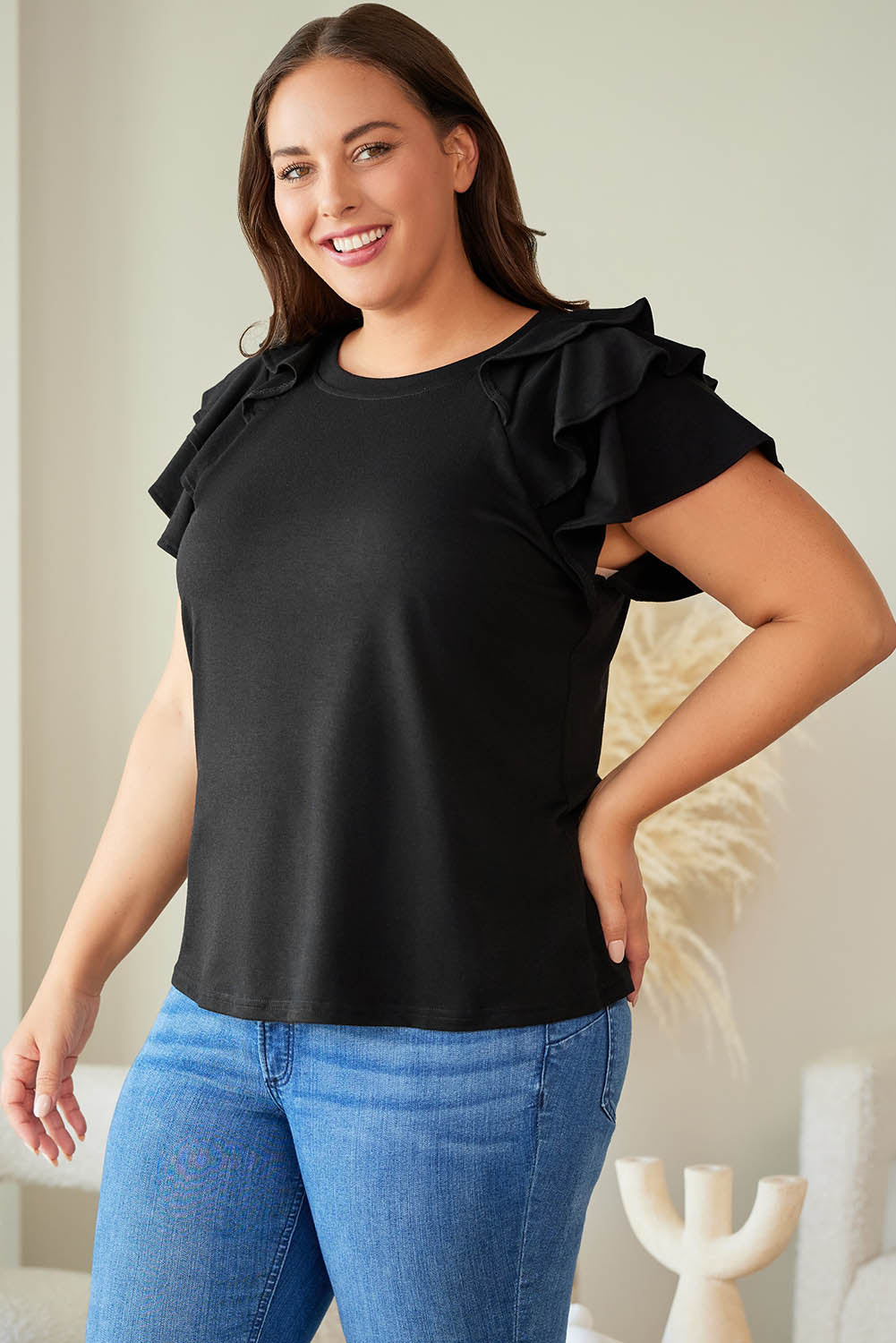 Blusa con mangas escalonadas