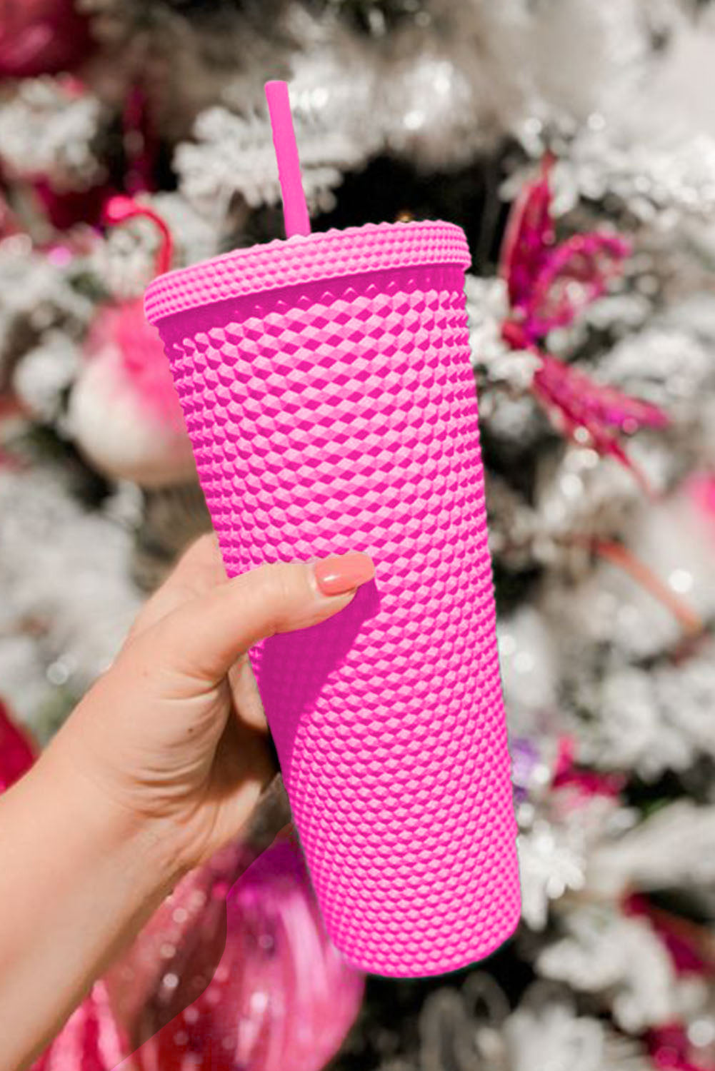 This stylish and eco-friendly cup is crafted with ABS Material and a unique diamond-textured exterior to provide secure sipping on the go. The firm construction and matte finish make it comfortable to hold, and the included lid and straw make it perfect for travel. From Moodz Boutique - choose from Green, Blush Pink, Hot Pink, or Black!