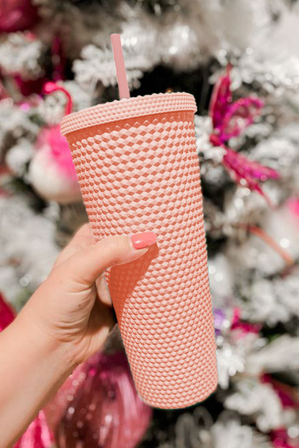 This stylish and eco-friendly cup is crafted with ABS Material and a unique diamond-textured exterior to provide secure sipping on the go. The firm construction and matte finish make it comfortable to hold, and the included lid and straw make it perfect for travel. From Moodz Boutique - choose from Green, Blush Pink, Hot Pink, or Black!