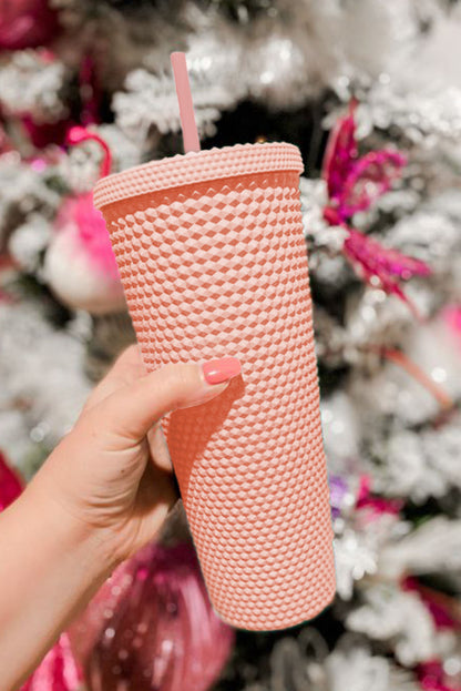 This stylish and eco-friendly cup is crafted with ABS Material and a unique diamond-textured exterior to provide secure sipping on the go. The firm construction and matte finish make it comfortable to hold, and the included lid and straw make it perfect for travel. From Moodz Boutique - choose from Green, Blush Pink, Hot Pink, or Black!