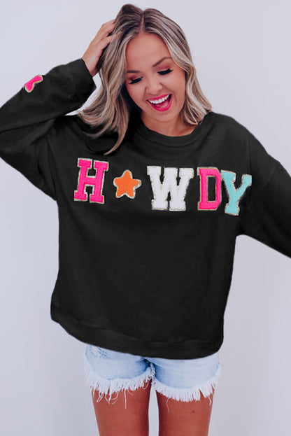 Vamp up your wardrobe with this fun pullover sweatshirt! The dazzling "HOWDY" graphic gives it a touch of pizzazz, and the star patterns on the sleeves make it extra darling. Made of 65% Polyester and 35% Cotton, you can choose from Black or White. Moodz Boutique has you covered!