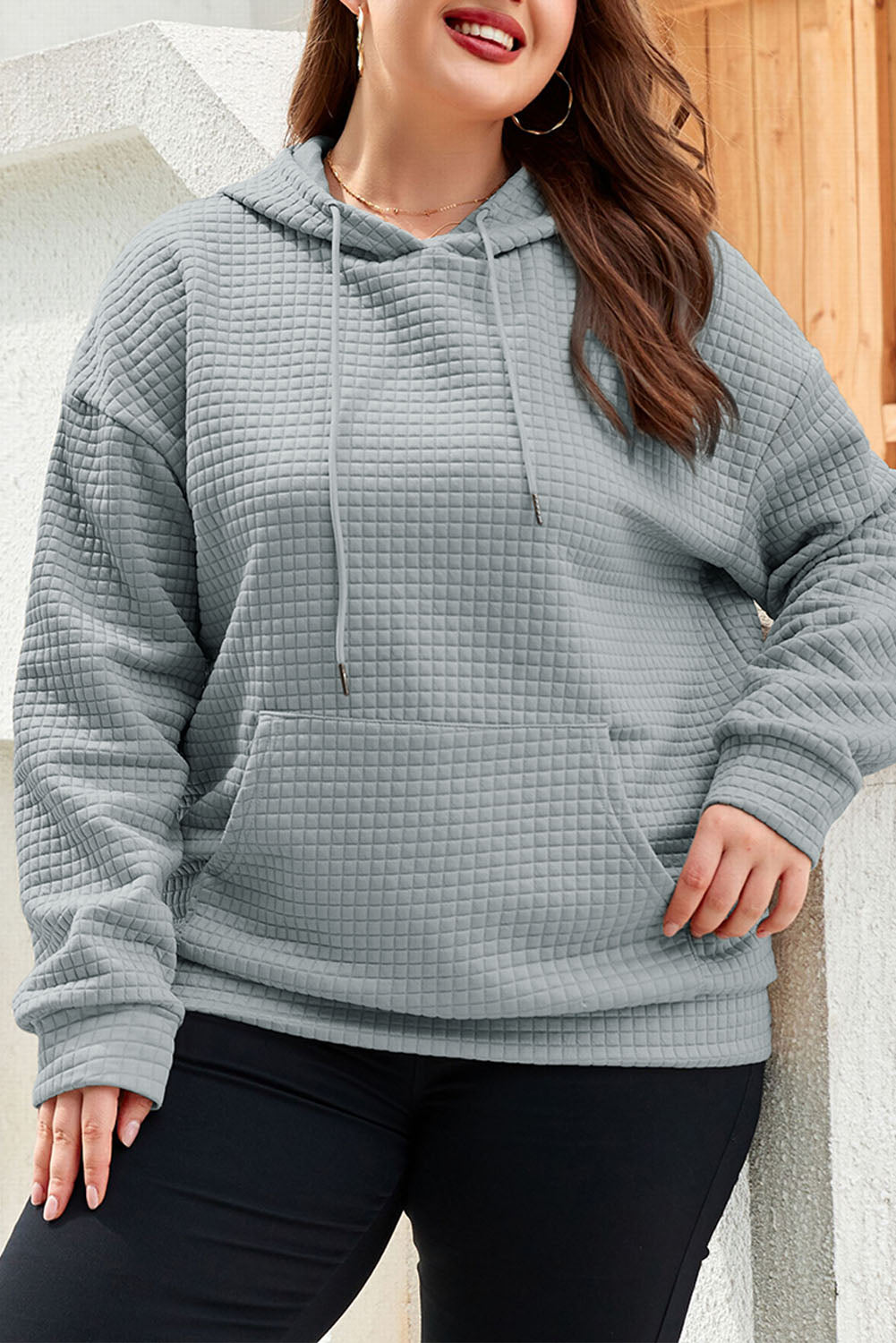 Sudadera con capucha acolchada de talla grande con bolsillos estilo canguro en color gris