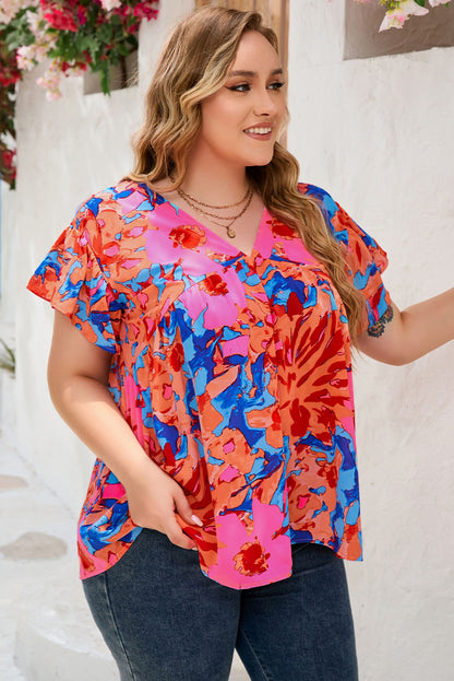 Blusa con escote en V y estampado floral abstracto en rojo 