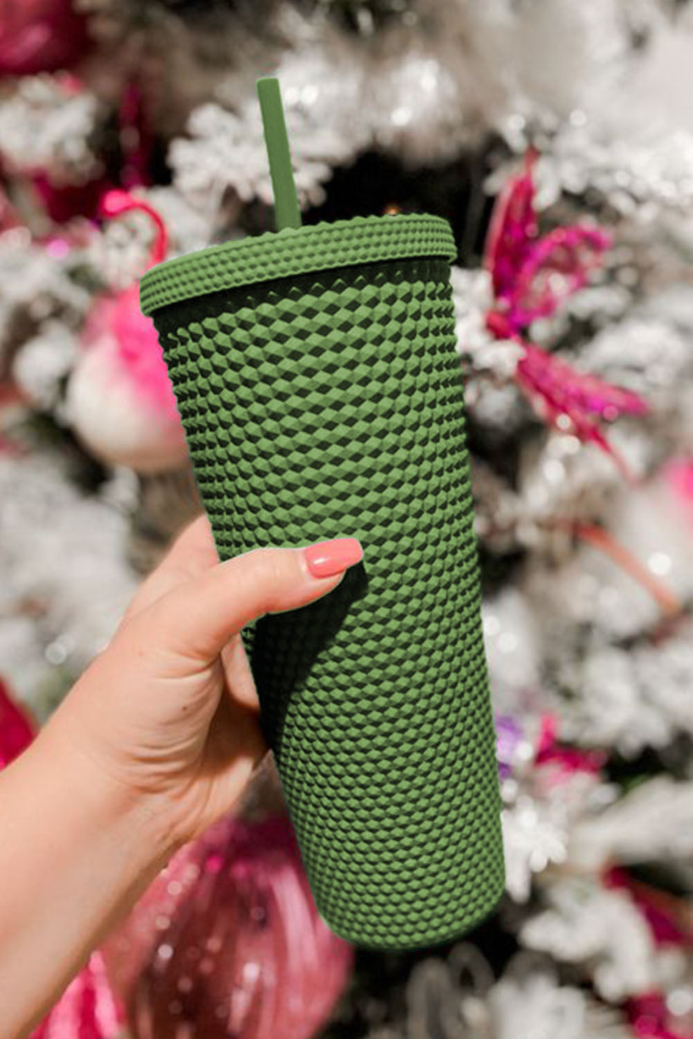 This stylish and eco-friendly cup is crafted with ABS Material and a unique diamond-textured exterior to provide secure sipping on the go. The firm construction and matte finish make it comfortable to hold, and the included lid and straw make it perfect for travel. From Moodz Boutique - choose from Green, Blush Pink, Hot Pink, or Black!