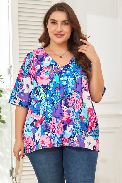 Blusa floral de talla grande con mangas dolman y escote en V en color azul cielo