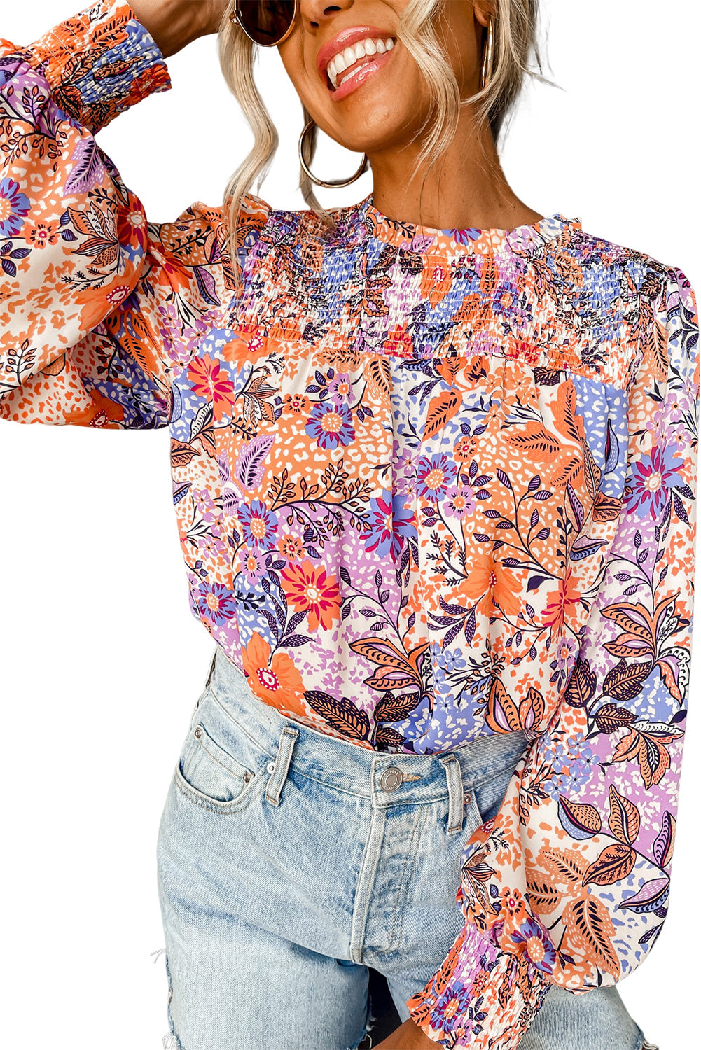 Blusa floral con mangas de obispo