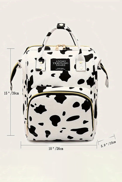 Mochila de lona con múltiples bolsillos y estampado de lunares de vaca en blanco brillante