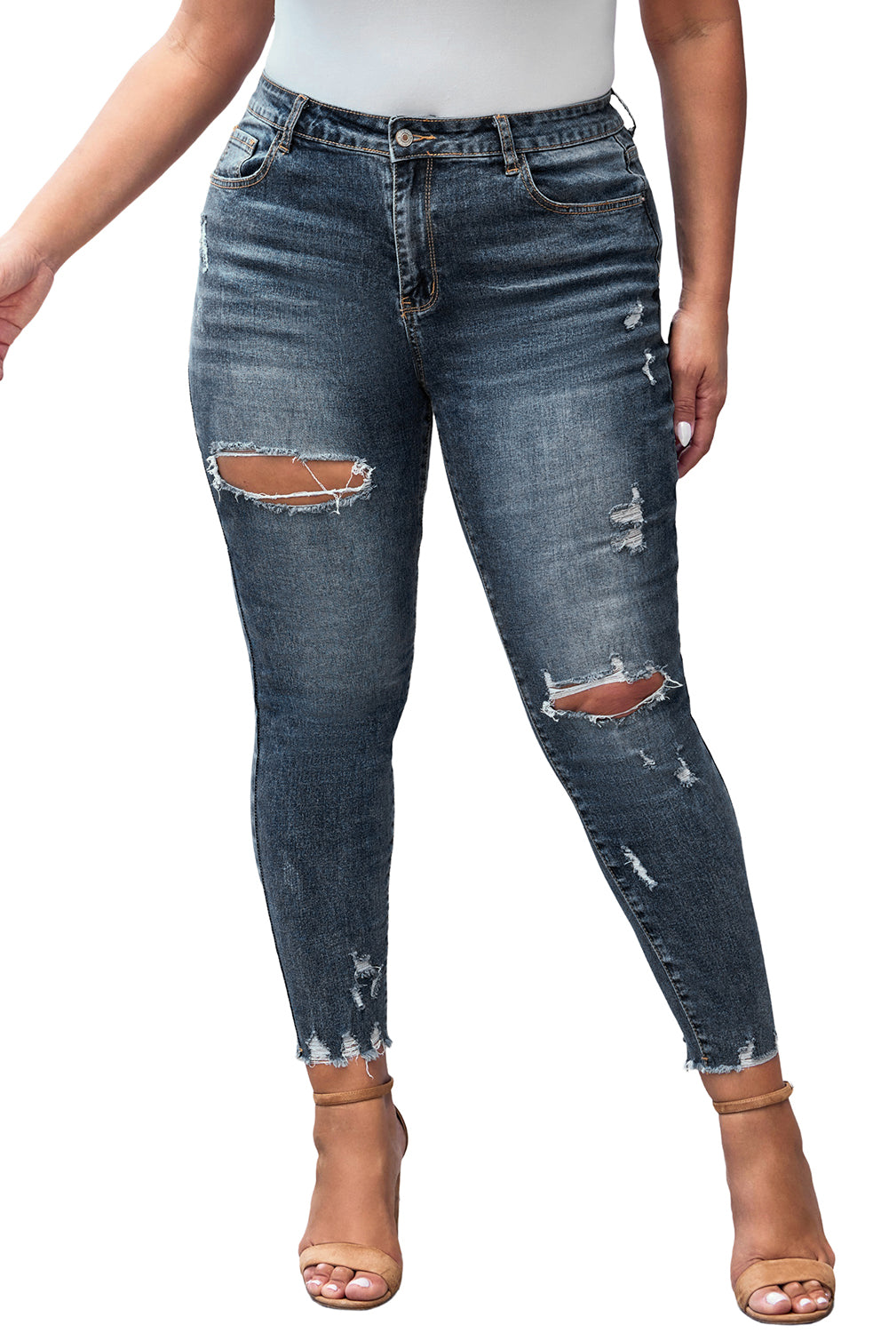 Flaunt your fab figure in these curvy jeans! Medium-wash denim with fading and distressed detailing creates a chic look, while the midrise waist and classic pockets are must-haves. Go for a frayed ankle-length hemline for a flirty finish, and don't forget the hidden zip fly with button closure. Get ready to rock 'em with any top from your wardrobe -- they're 70% cotton, 28.5% polyester, 1.5% elastane.