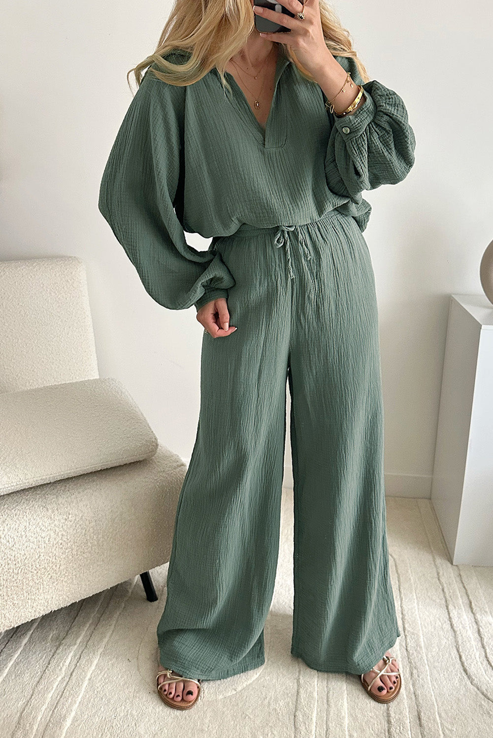 This Set adds eye-catching pizzazz with its Crinkle Split Top & Loose Drawstring Pants! Feminine, fun puff sleeves guarantee to turn heads. Soft, breathable 100% Cotton in Mist Green.