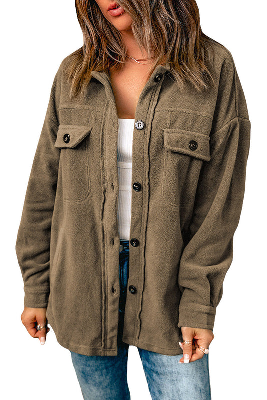 Um, stylish shirt-jacket with a long sleeve, tidy-collared look? Breezy button closure for effortless on/off-ing. Solid hue adds a glint to your glam. Plus, side and flip pockets for stashing stuff—100% Polyester, in Brown or Beige.