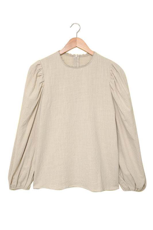 This Billowed Sleeve Blouse from Moodz Boutique will keep you comfy and stylish all day long! The 100% cotton fabric will feel like a dream against your skin. Come and get it in that gorgeous Beige shade!