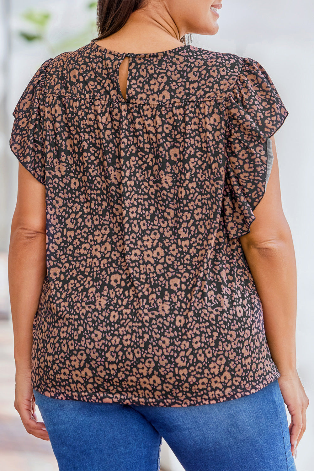 Blusa con frunces y flores 