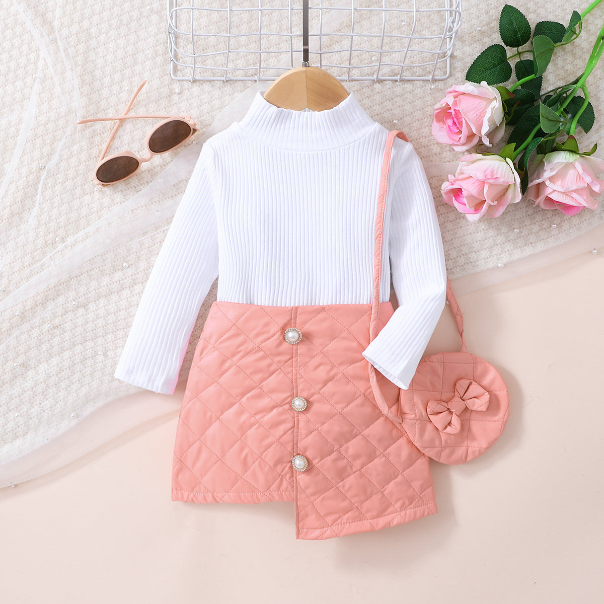 Conjunto de top de punto y falda con botones decorativos para niñas con bolso