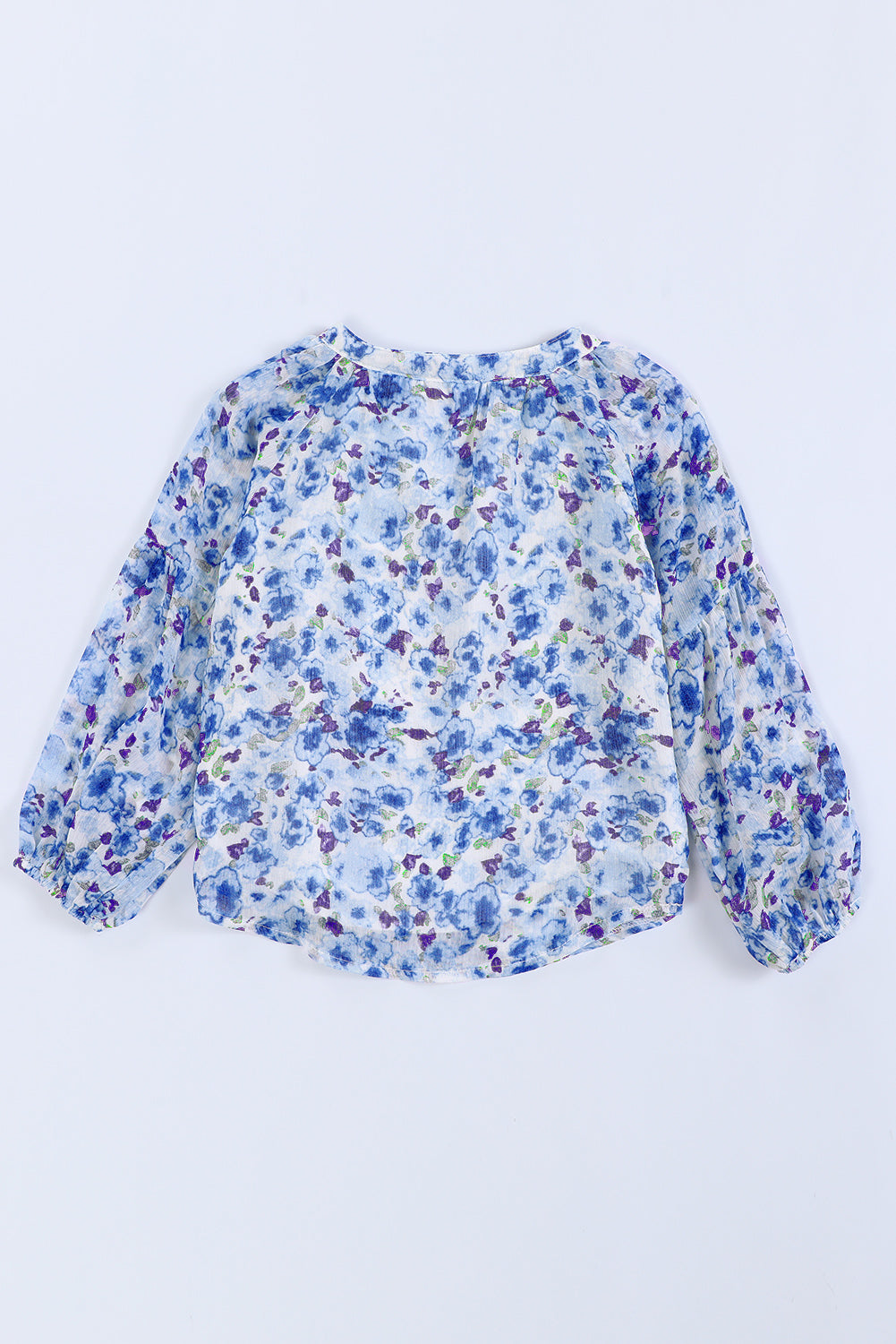 Blusa estampada con cuello entallado y mangas abullonadas para niñas