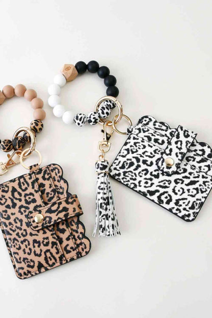 Minibolso de mano con borlas y llavero de leopardo, paquete aleatorio de 2 unidades