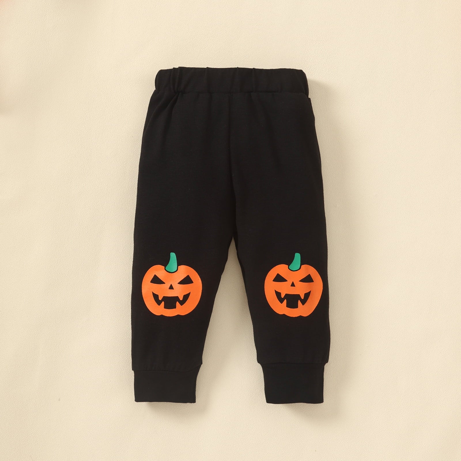 Dress your little one in ultimate spooky style with this Long Sleeve Baby & Toddler Graphic Hoodie & Pants Set! The hooded neckline, long sleeves, and comfy cotton-blend material will make sure they stay cozy and Halloween-ready!