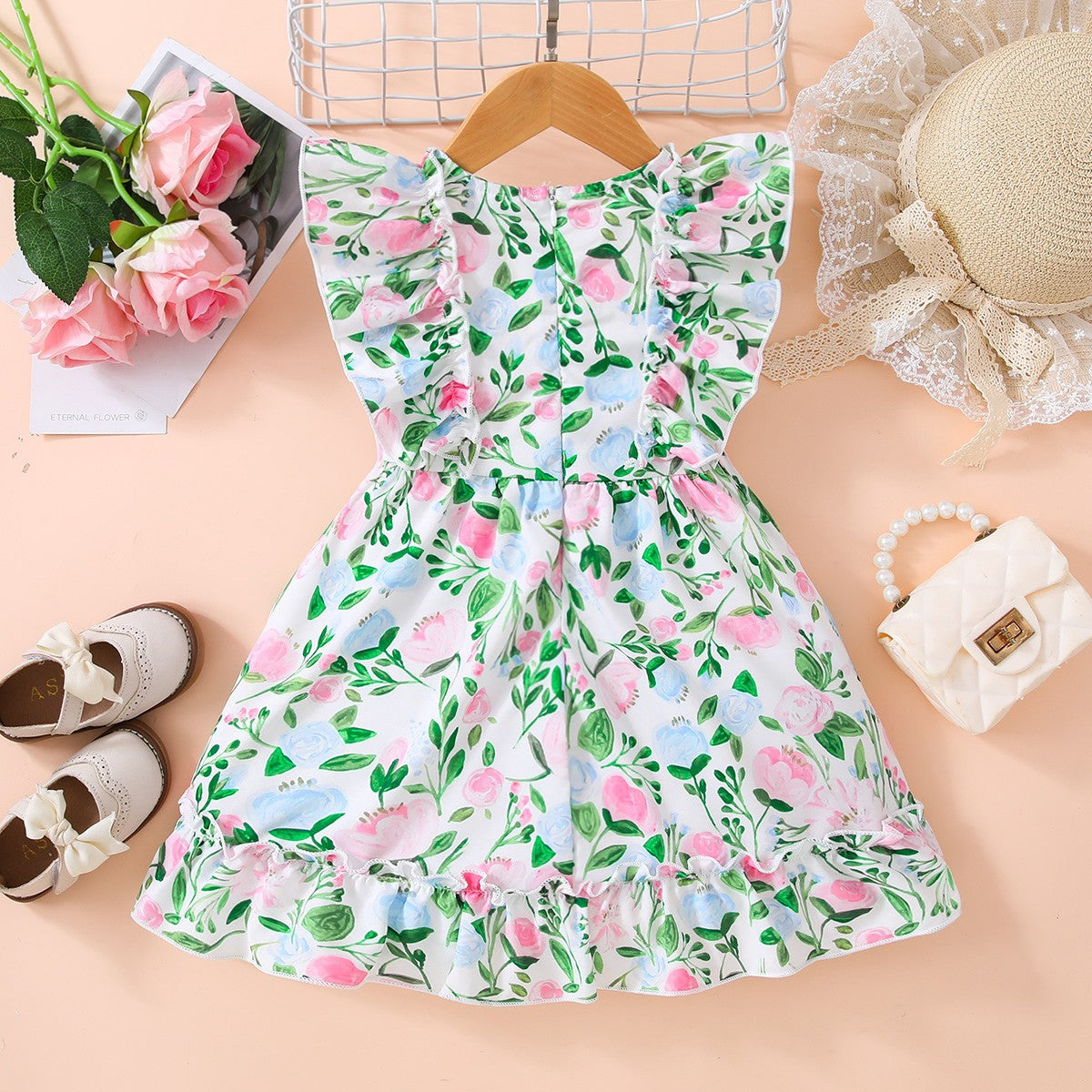 Vestido con volantes y detalle de lazo floral para niñas