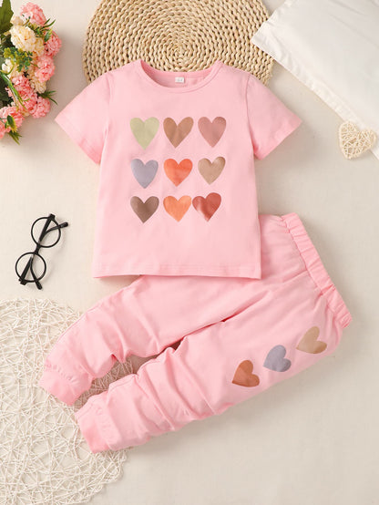 Conjunto de camiseta y joggers con estampado de corazones para niñas