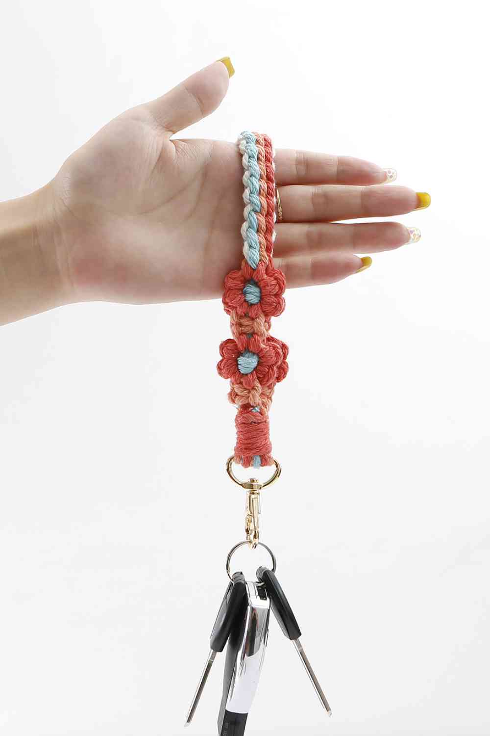 Llavero de pulsera con forma de flor