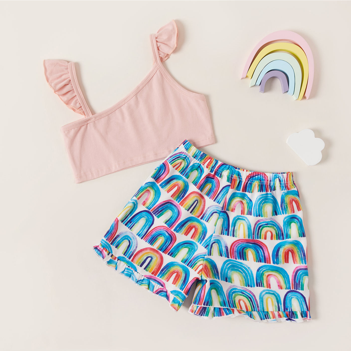 This Peach Top & Rainbow Shorts Set is chic and timeless, crafted from a delicate cotton blend and featuring an asymmetrical neckline with sleeveless construction. Exquisite in its tailoring and delightful to the touch, this premium set is available in Toddler and Girl sizes.