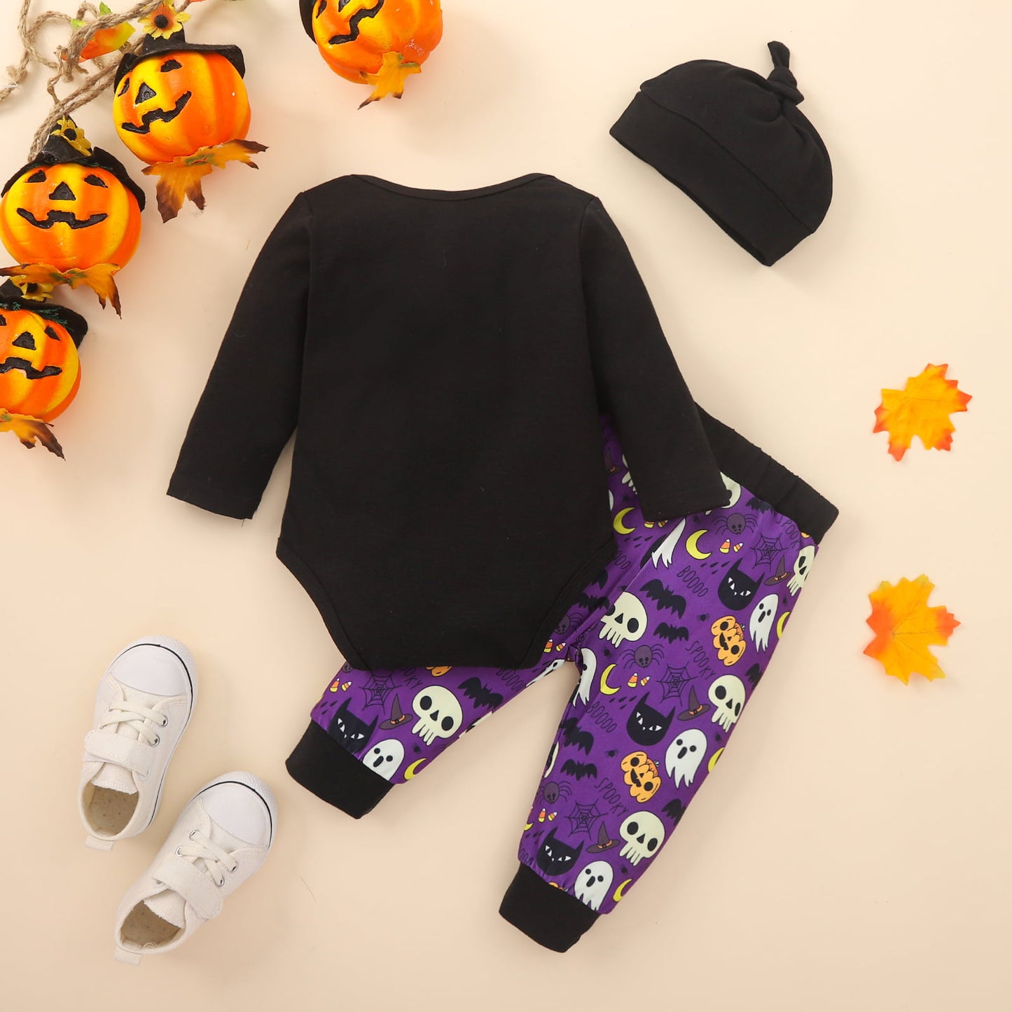 Show off your little one's 1st Halloween in this joyfully graphic onesie & pants set! With a polyester-cotton-spandex top and a poly-spandex pants, your babe will be boo-tifully dressed. And don't forget the hat — it's the perfect accessory for those long sleeves!