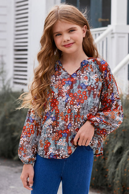 Blusa estampada con cuello entallado y mangas abullonadas para niñas