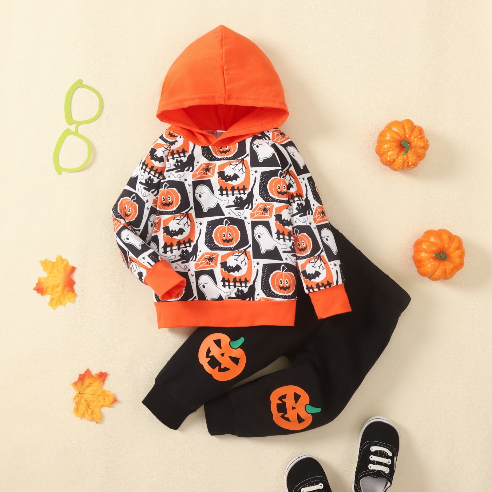 Dress your little one in ultimate spooky style with this Long Sleeve Baby & Toddler Graphic Hoodie & Pants Set! The hooded neckline, long sleeves, and comfy cotton-blend material will make sure they stay cozy and Halloween-ready!