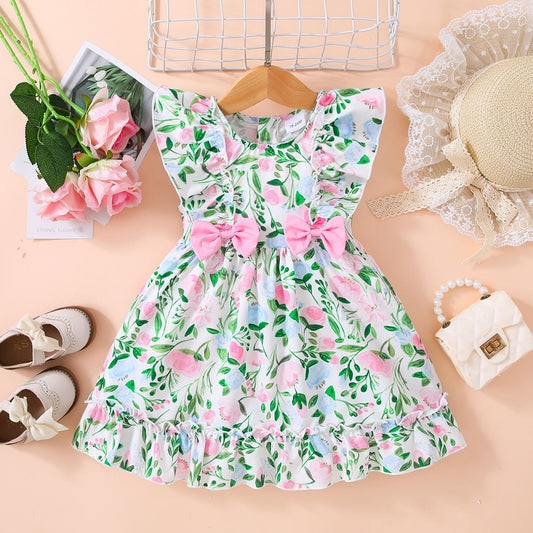 Vestido con volantes y detalle de lazo floral para niñas