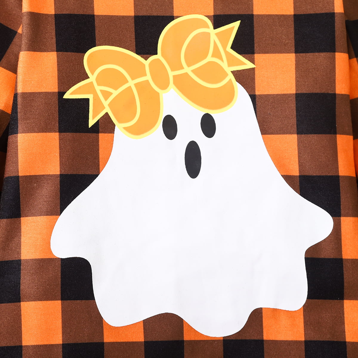 Show off your sizzlin' style in this Plaid Ghost Graphic Jumpsuit! It's got a ruffled bow, long sleeves, and is available in baby and toddler sizes. Plus, it's made from a cozy 95% polyester and 5% spandex blend. What's not to love?