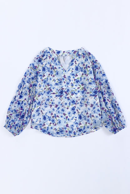 Blusa estampada con cuello entallado y mangas abullonadas para niñas