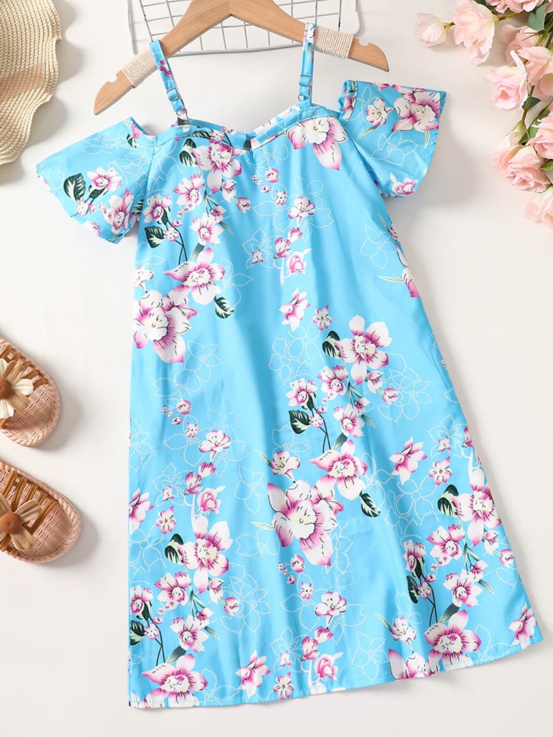 Pattern: Floral fiend's dream! Girls Floral Cold-Shoulder Flutter Sleeve Dress in pastel blue. Neckline: Off-shoulder Length: Long Sleeve Length: Short and sweet! Material composition: 100% polyester